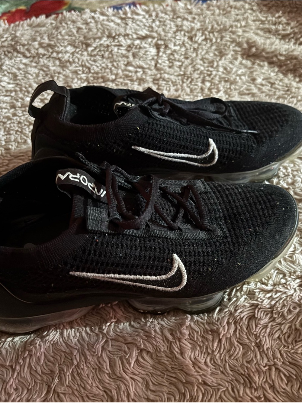Nike Black Flyknit VaporMax Sneakers with White Swoosh